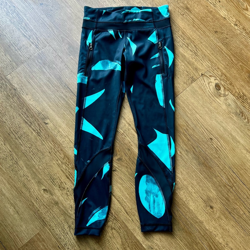 Lululemon Inspire Tight II Back Spin Stroke Peacock Blue Black Women's size 4